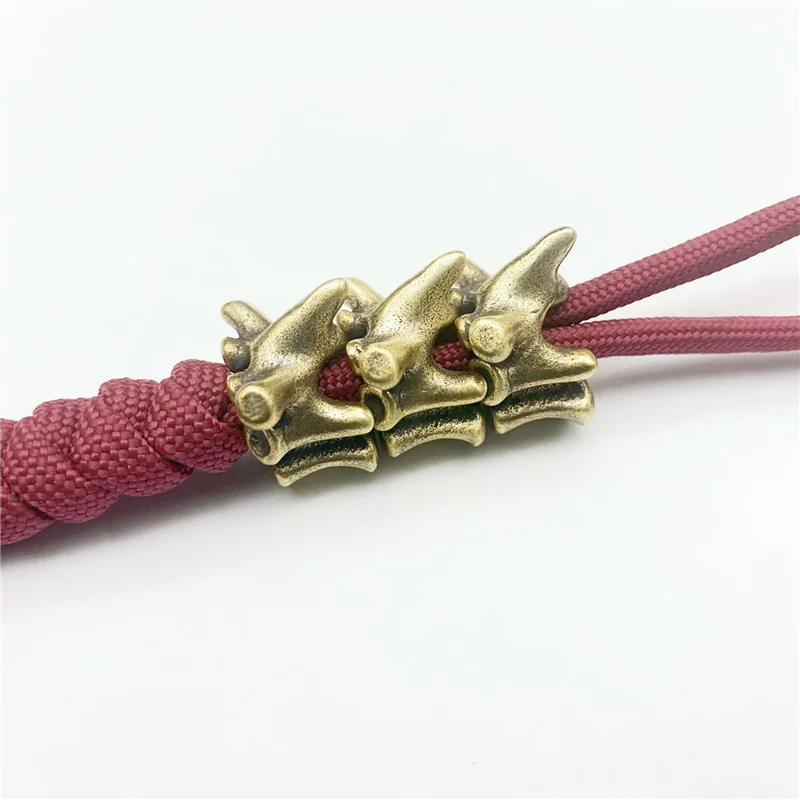 

Bone Shape DIY Accessories Outdoor Survival Umbrella Rope Bracelet Braided Multifunctional Buckle Brass Keychain -C