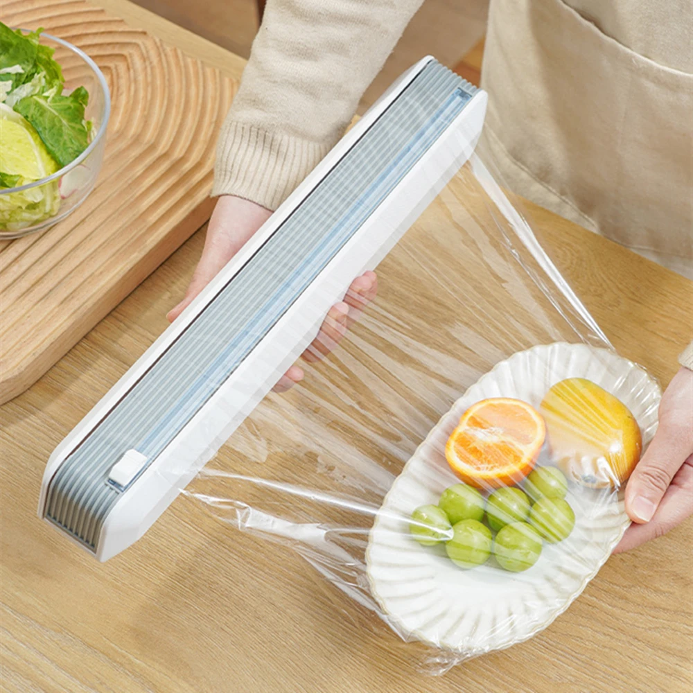 

Japan Plastic Wrap Cutter Cling Film Cutting Box Tinfoil Cutter Dispenser Kitchen Wall-mounted Magnet adsorption and Suction Cup