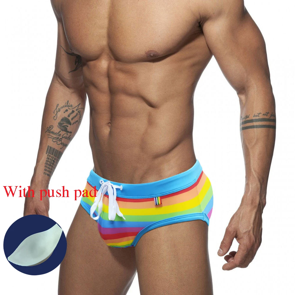 

New Men's Rainbow Striped Swim Shorts Sexy Catwalk Beach Swimming Surf Briefs Summer Stretch Swim Shorts With Push Pads And Rope