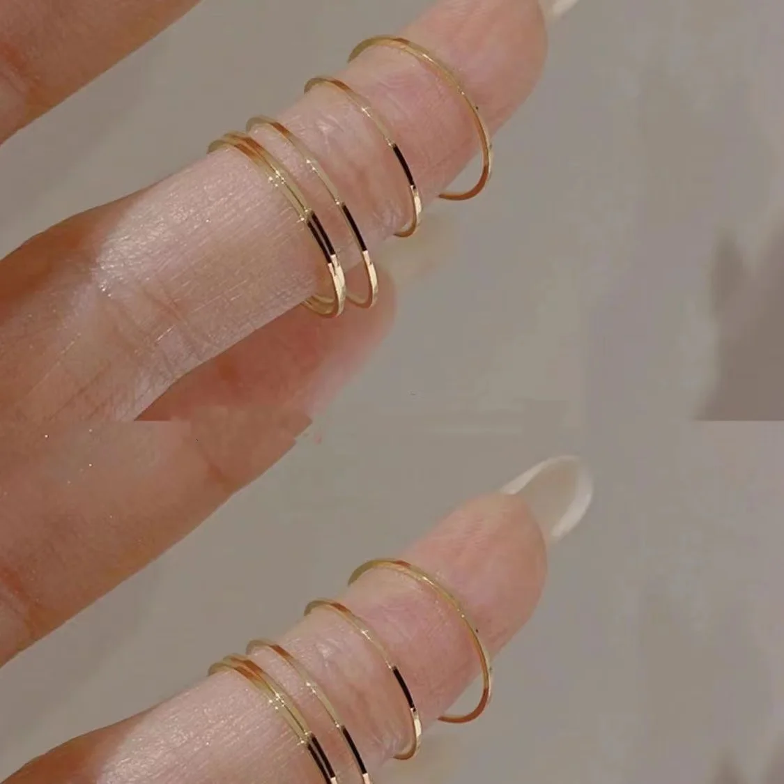 

Titanium steel color preserving cold scenery surface ring female simple exquisite niche design fold wear tail ring joint ring