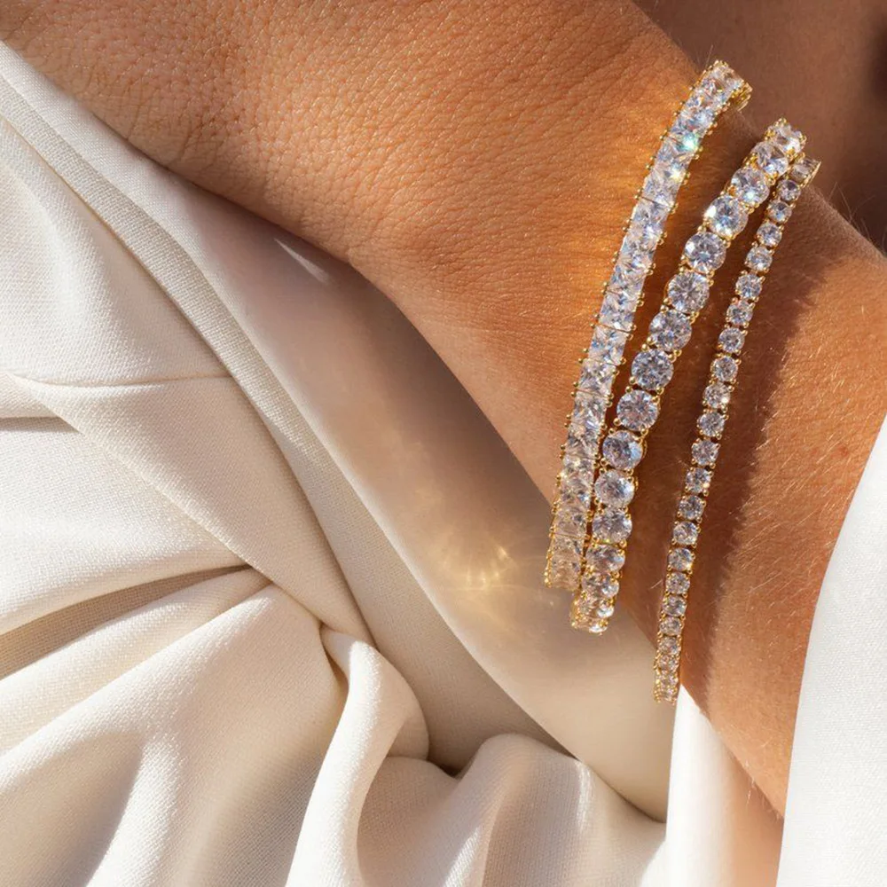 Браслет женский теннисный золотистый с кристаллами и фианитами