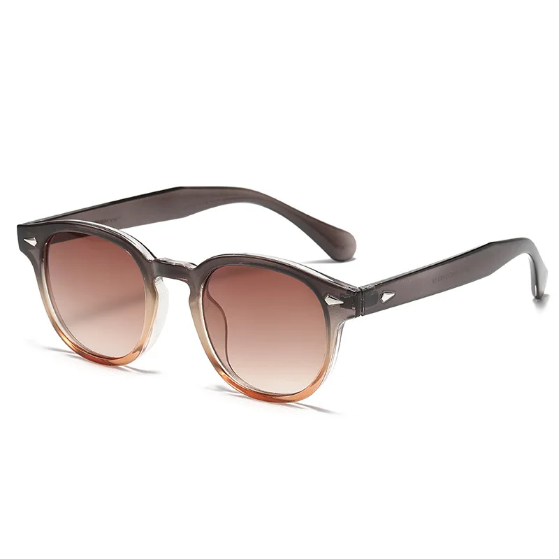 Очки солнцезащитные женские в круглой оправе с заклепками и защитой UV400