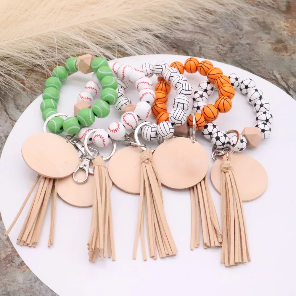 

2022 Popular Sports Series Small Gift Key Chain Football Volleyball Baseball Softball Pattern Wooden Bead Wrist Tassel Key Ring
