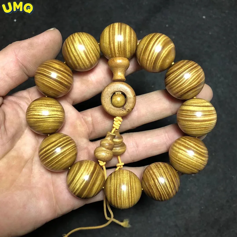 

Big Leaf Gold Nanmu Hand String 20mm Buddha Bead Hand String Gold Nanshuibo Wenwan Buddha Bead Bracelet
