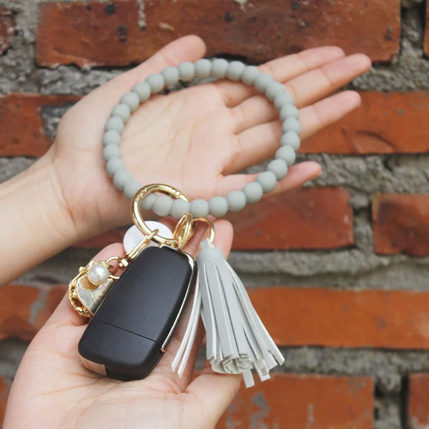 

Silicone Bead Bracelet Keychain for Women Girls Simple Round Beads Bracelet Bangle PU Leather Tassel Key Chain Gift 2023 New