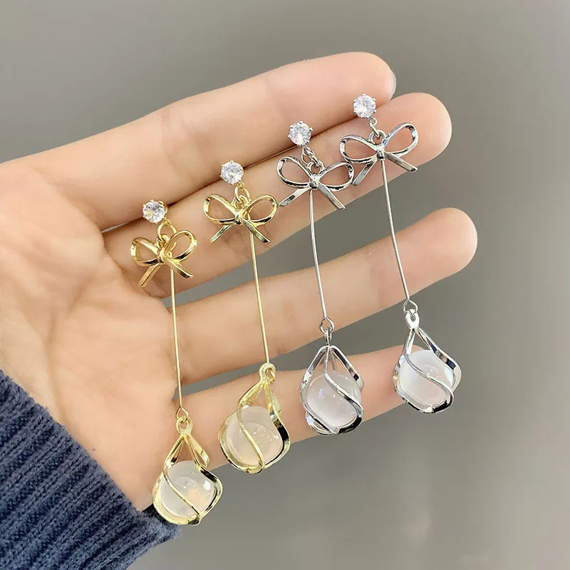 

Классические женские украшения Lucky Bow Длинные серьги с бахромой для женщин Ажурный белый опал Золотые вязаные серьги Шарм Ювелирные изделия