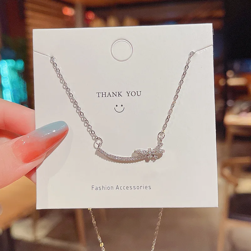 

New Personality Geometry Micro Inlaid Bow Pendant INS Net Red Tide Titanium Steel Temperament Simple Clavicle Chain