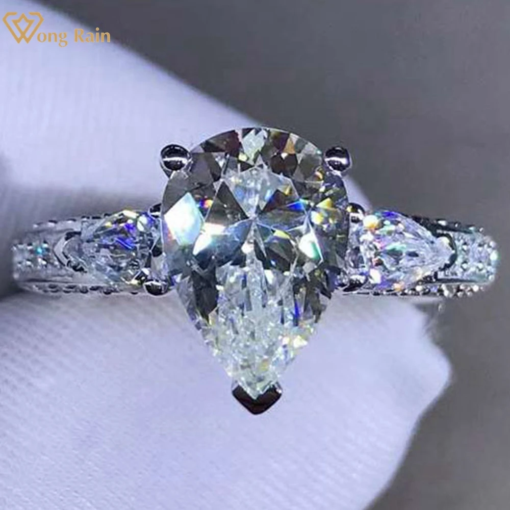 

Wong Rain, Стерлинговое Серебро 925 пробы, VVS 3EX 2CT, огранка груши, созданная из моиссанита, драгоценный камень, обручальное кольцо для женщин, ювели...