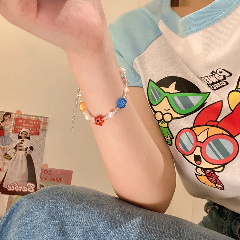 

Contrast color flower natural pearl bracelet female ins niche design hand beaded new female girlfriend bracelet