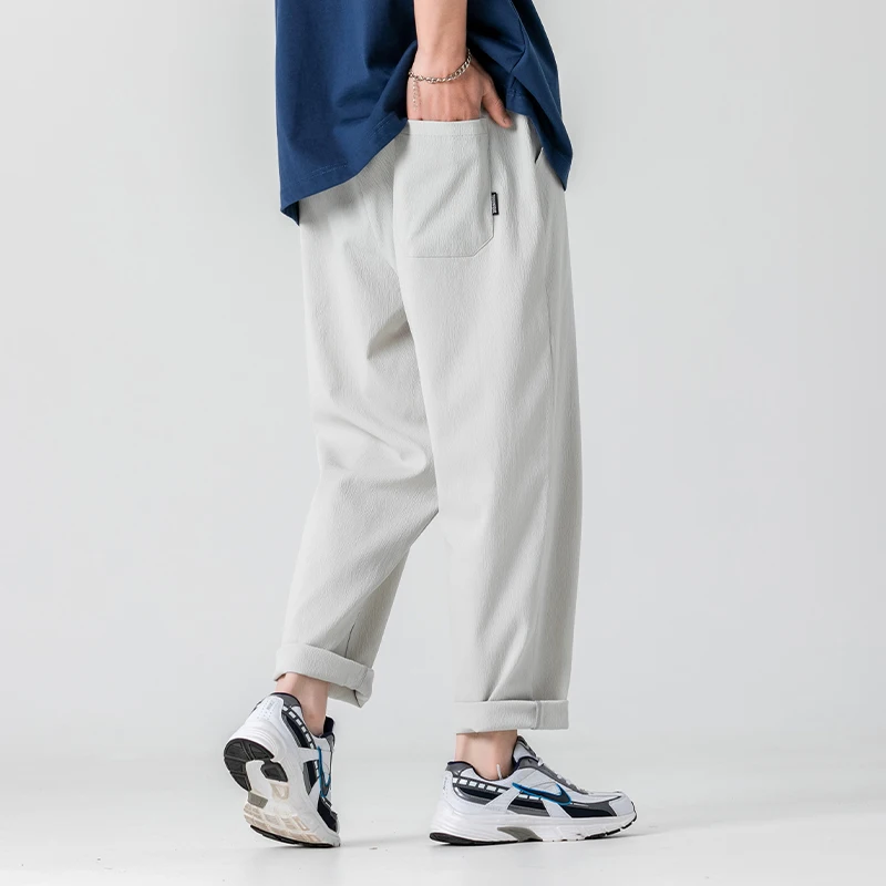 New Men's clothing Personalized belt Designer Draped Loose Casual Sports Pants Hip Hop Streetwear 2022 Fashion Men Pants