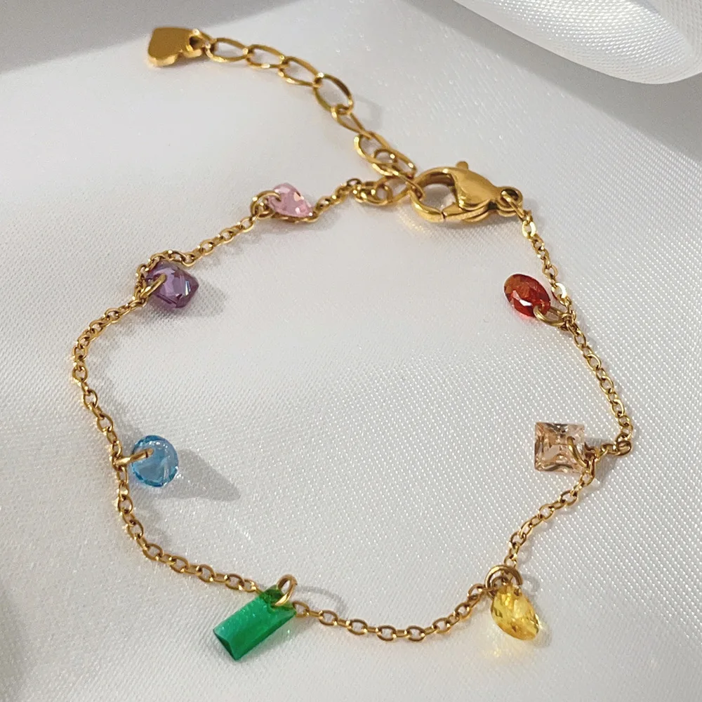 

Цепочка на ногу из титана и нержавеющей стали с разноцветными фианитами