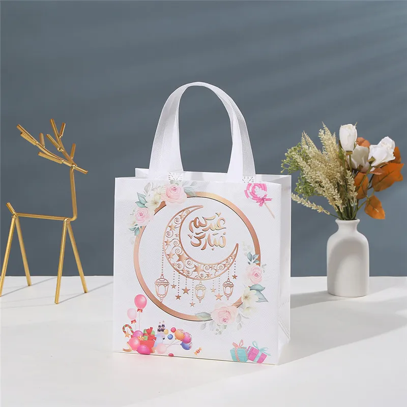 

4/8Pcs Eid Mubarak Nonwoven Fabric Gift Bag with Handle Ramadan Kareem Dragee Candy Cookie Packing Box Muslim Islamic 2023