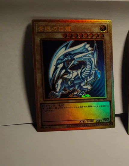 Фото Коллекционная игрушечная карточка Yu-Gi-Oh 20th SER / PSER с голубыми глазами, белый дракон/темная волшебная девушка, японский/английский (не оригинал) №3