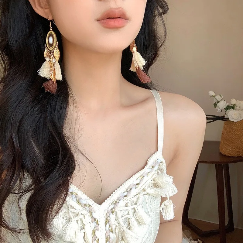 Богемные серьги с бахромой из рисовых бусин и каплями воды нишевые крючком для