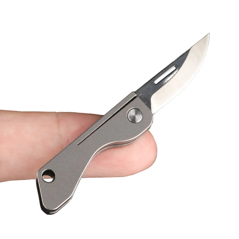 

Portable Titanium Alloy Mini Knife Camping EDC Gadgets Keychain Box Letter Opener Folding Knife Outdoor Survival Multitools