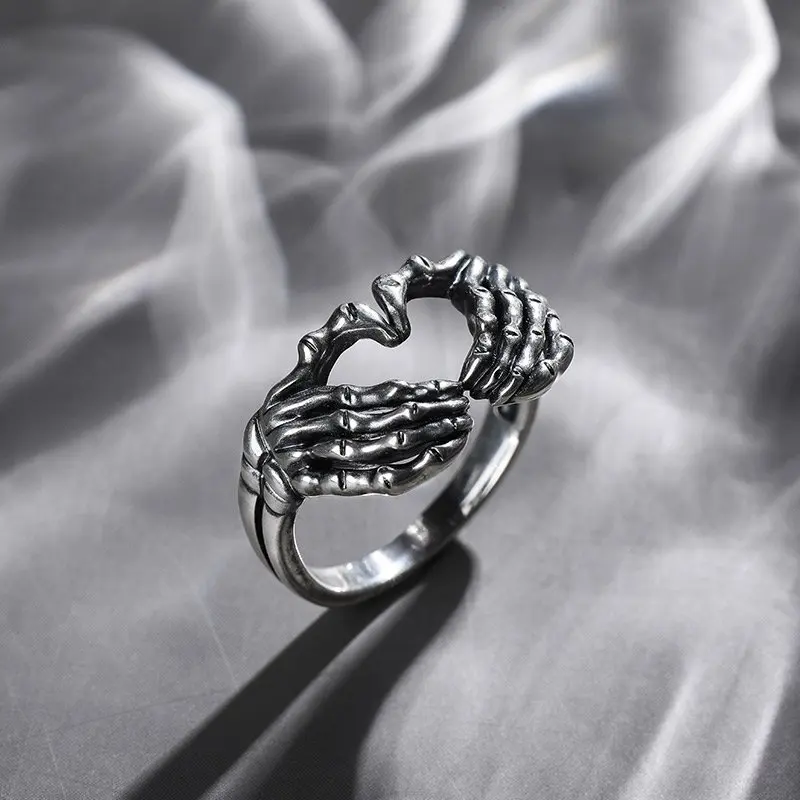 

Punk Gothic Silver Plated Hand with Heart Rings for Men Creative Skeleton Couple Ring Women Hip Hop Band Jewelry Charm Gift