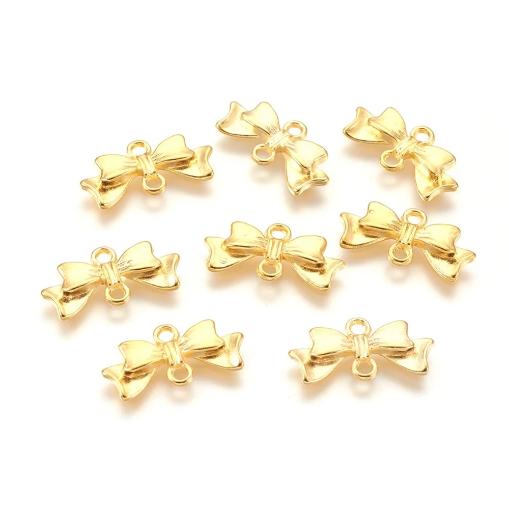 

NBEADS 100PCS Alloy Links connectors Lead Free and Cadmium Free Bowknot Golden 20mm long 10mm wide 3mm thick hole: 2mm
