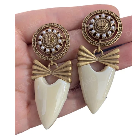 Винтаж серьги-гвоздики из меди с позолотой в форме банта