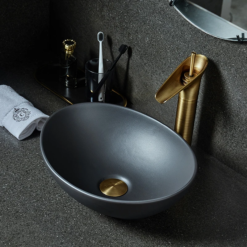 

Black flower shape Chinese Cloakroom Counter Top porcelain wash basin bathroom sinks ceramic art round wash basin countertop