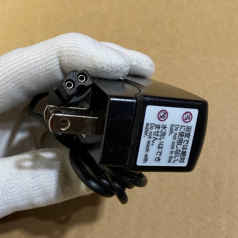Фото Новый оригинальный адаптер переменного тока DC 3.4V 870mA для бритвы-триммера Hitachi KH-48, зарядное устройство с кабелем питания, совместимое с KH-76 №2