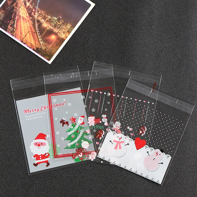 Фото 100 шт. новогодние 2023 рождественские пакеты в виде Санта-Клауса снеговика сотофана