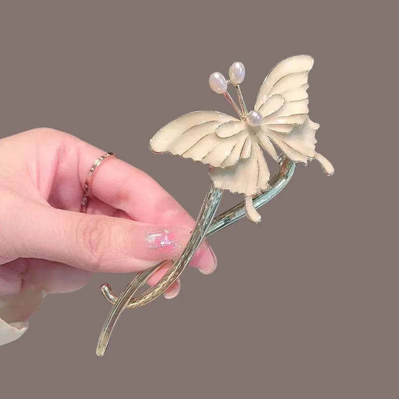 

Super Immortal Pearl Butterfly Metal One-word Clip Advanced Feeling Disk Hair Ornament Online Celebrity Hairpin