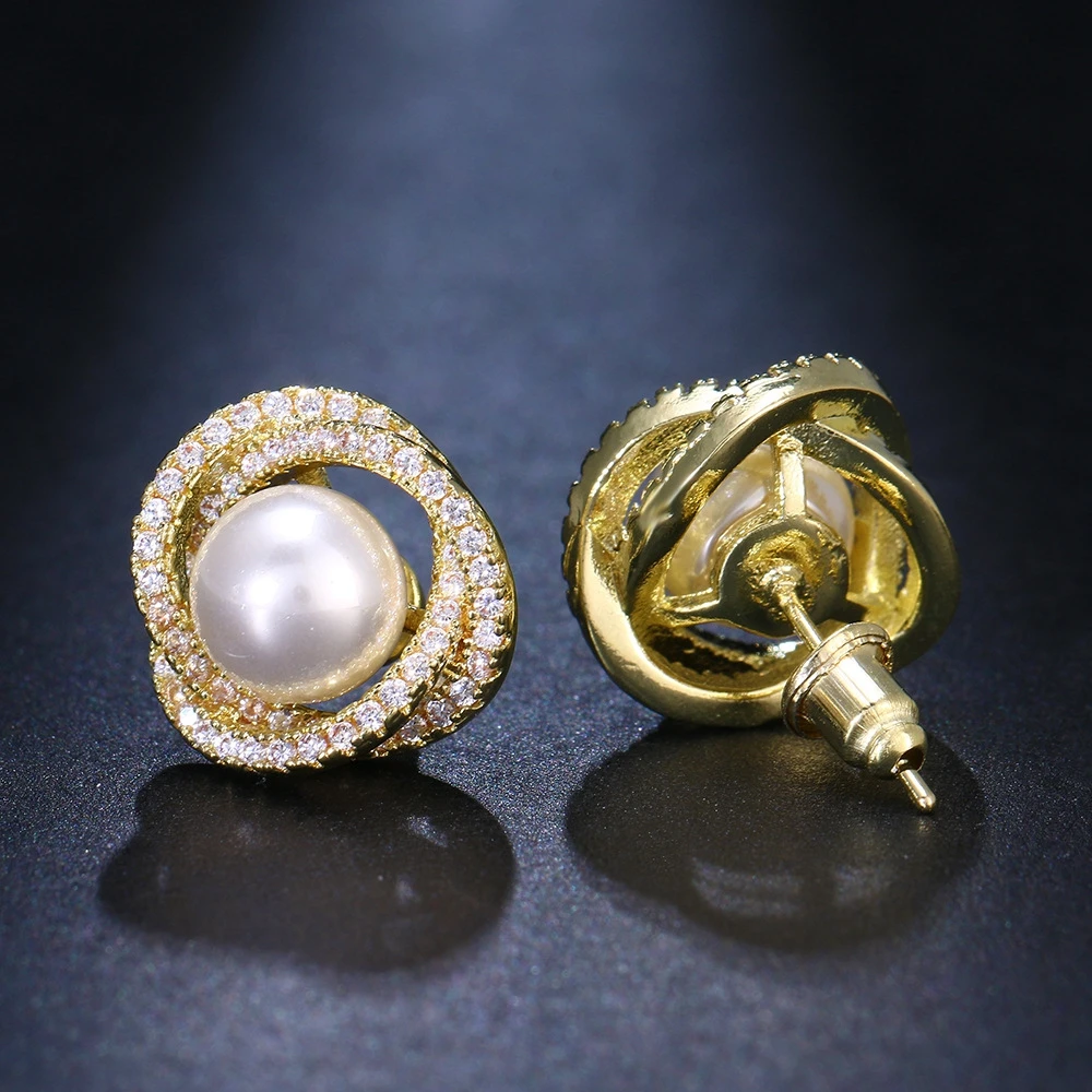 

Женские серьги-гвоздики с вихревым жемчугом