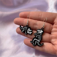 cool quirky dinosaur trex and triceratops black and white cartoon skeleton drop dangle earrings handmade on silver plated hooks
