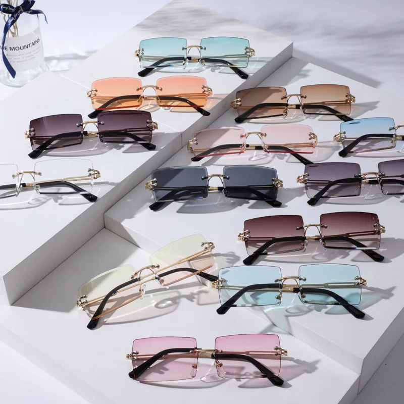 

foreign trade rimless square metal frame sunglasses women 2022 luxury brand designer aesthetic streetwear sun glasses oculos uv4