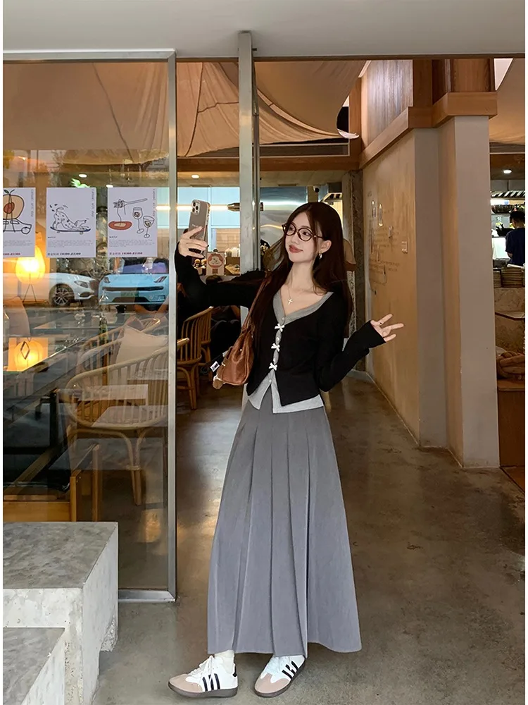 Искусственная двухсекционная короткая трикотажная рубашка с бантом женская