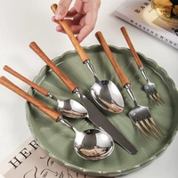 high grade huanghuali wood small waist shaped table knife fork spoon knife and fork spoon non magnetic stainless steel 4 pie