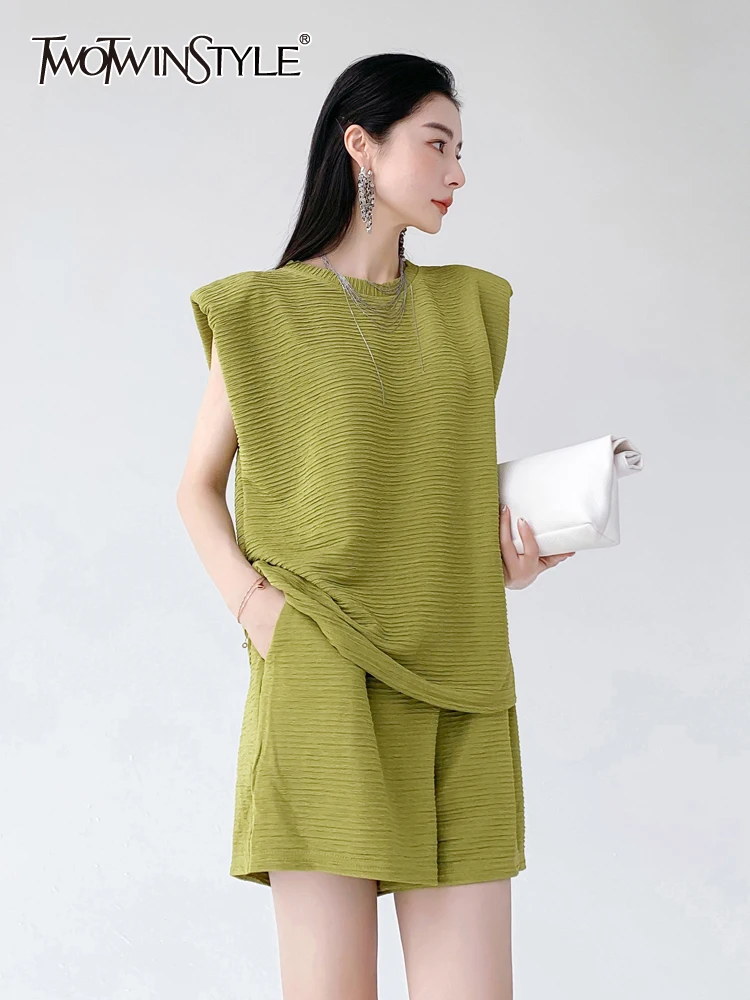 

Женский комплект из двух предметов TWOTWINSTYLE, однотонный винтажный комплект из двух предметов, пуловер без рукавов с круглым вырезом и шорты с ...