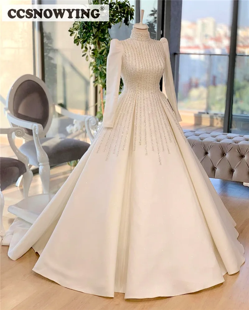 

Ball Gown Long Sleeve Arabic Dubai Wedding Dresses for Bride 2022 Satin Beaded High Neck Muslim Bridal Gowns Vestidos De Novia