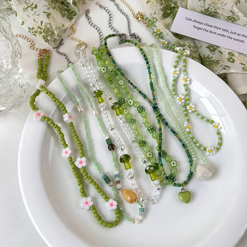 

Girl Heart Small Fresh Pearl Rice Bead Flower Necklace Sweet Fashion Temperament Design Clavicle Chain Pendant Pendant