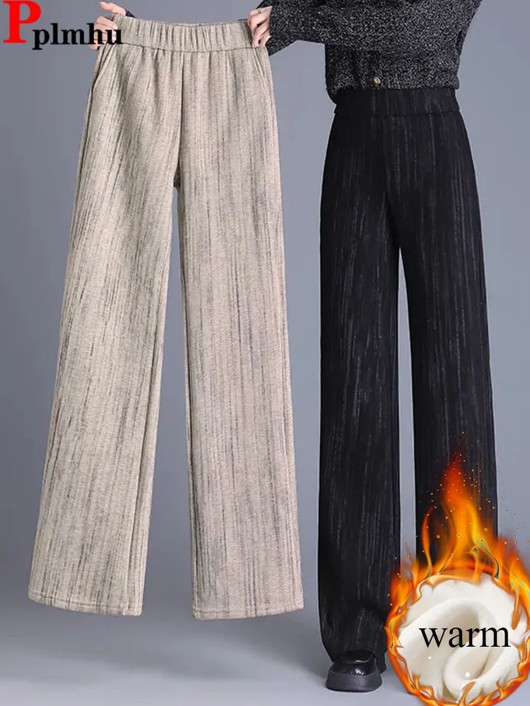 Зимние теплые свободные широкие брюки женские эластичные с высокой талией и