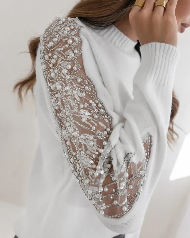 Рисунок 6 - Женский вязаный свитер с контрастными блестками