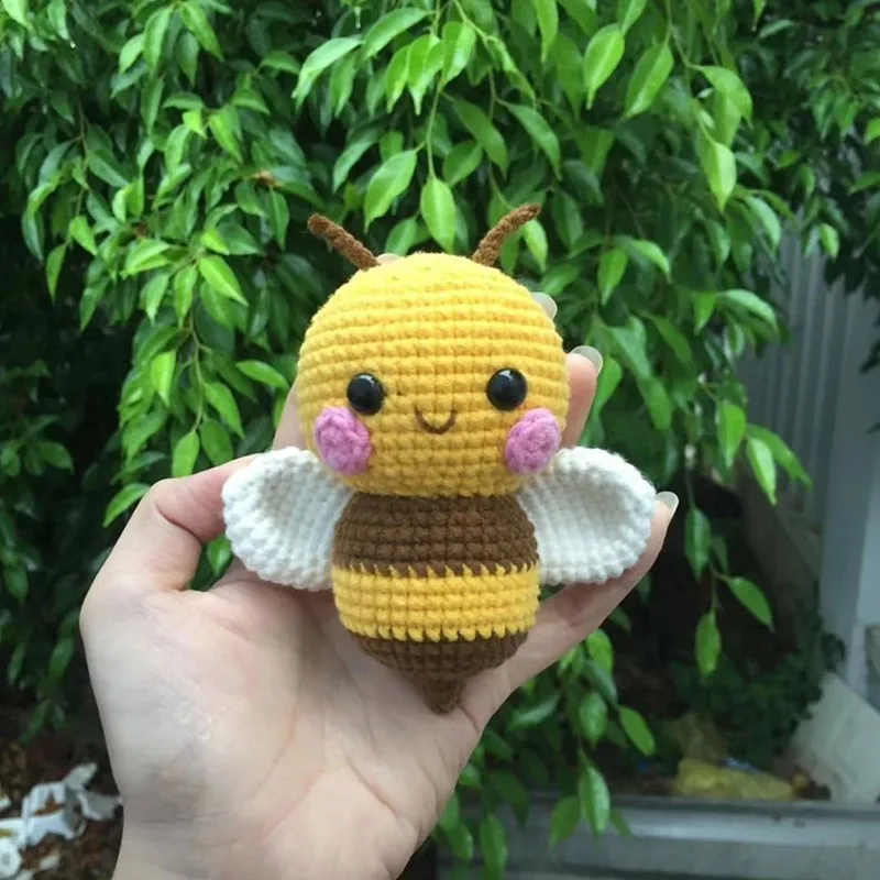 

Hand woven wool little bee