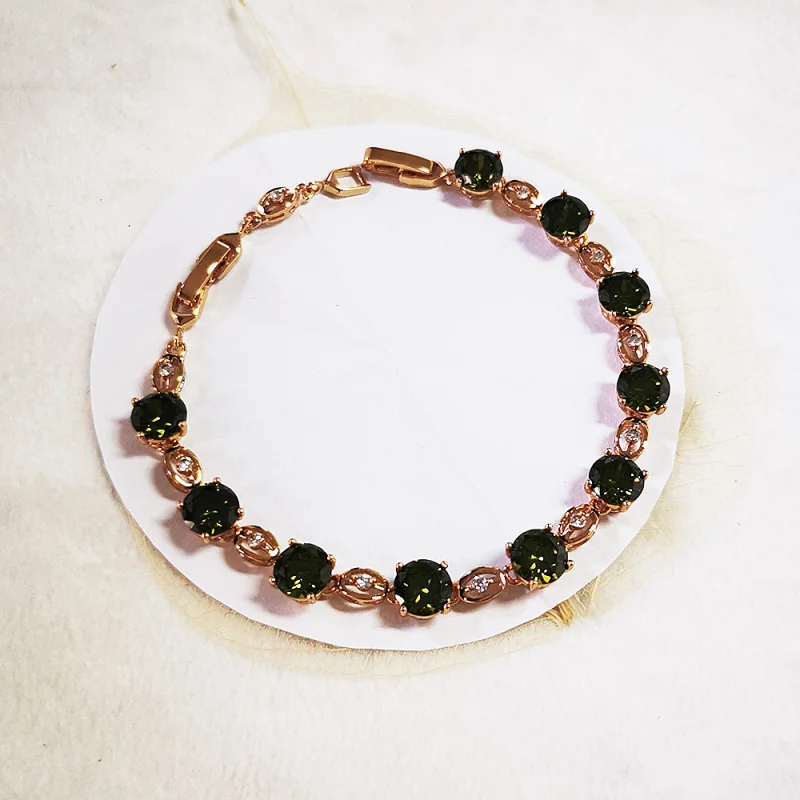 

Очаровательная Женская бижутерия ROLILASON золотистого цвета с зелеными кристаллами TB1177