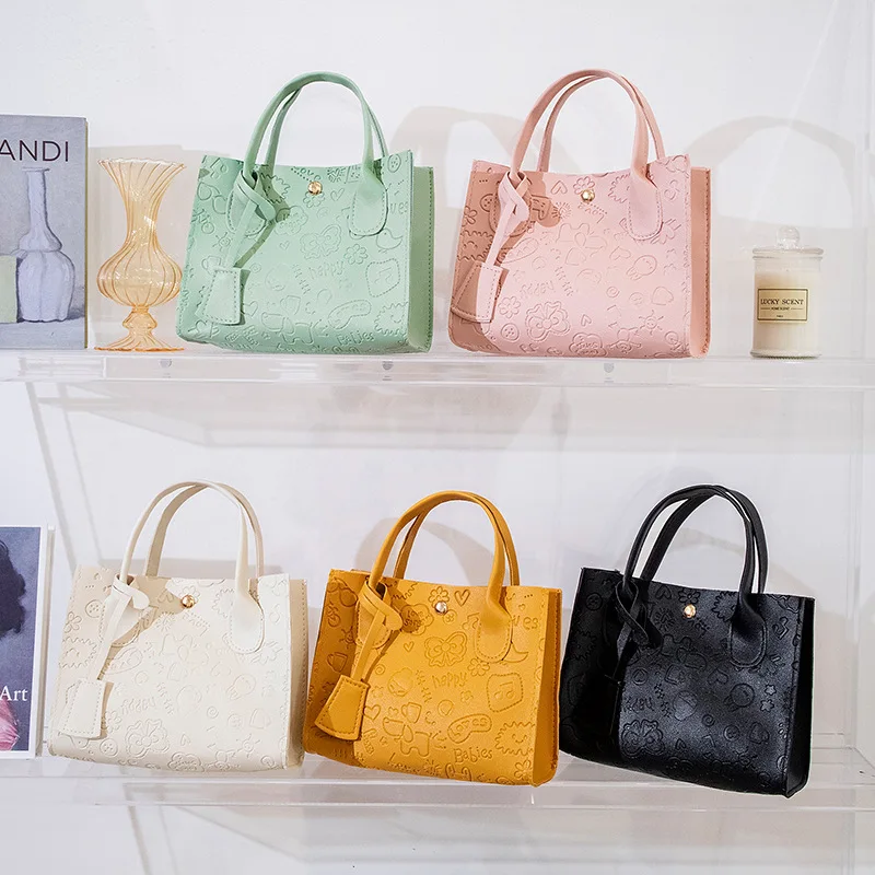 

2023 New Women's Fashion Handbags Retro Solid Color PU Leather Crossbody Shoulder Bag Cute Pattern Casual Women Handbags