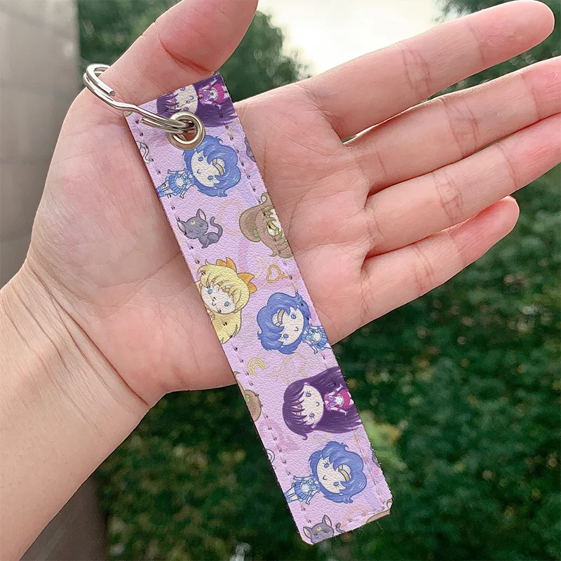 

Japanese anime Moon CutiEs Leather Keychain Strap Keyrings Hanging Holder Bag Car Wallet Trinket Keychain Hanging Decoration