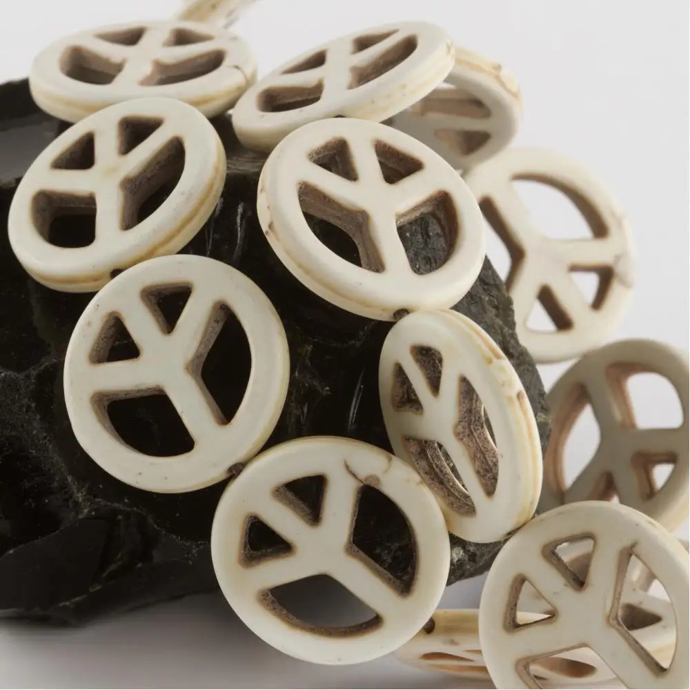 

2,5 cm peace sign turquoise stone