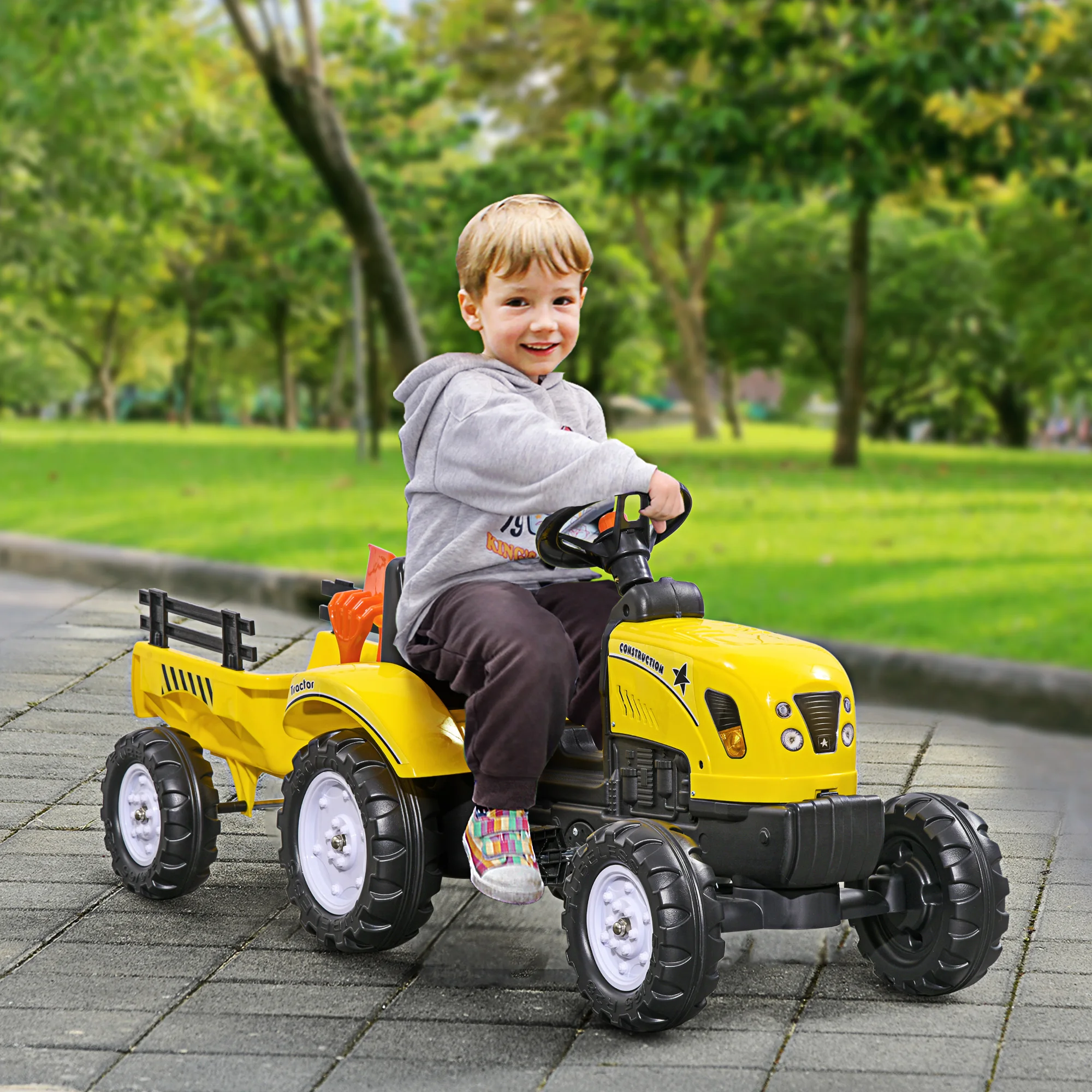 juguete tractor con remolque Niño