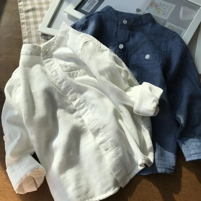 

Блузка однобортная с круглым вырезом и длинными рукавами