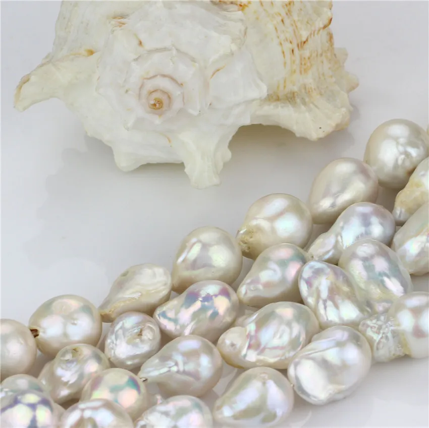 

Irregular shape pearl strand 15-16mm AA- nucleated freshwater pearl strand wholesale