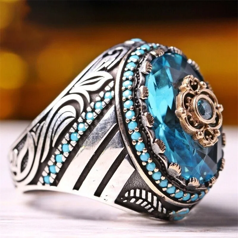 

New European and American Retro Twill Egg-shaped Blue Gemstone Ring Men and Women Trendy Fashion Flower Index Finger Ring
