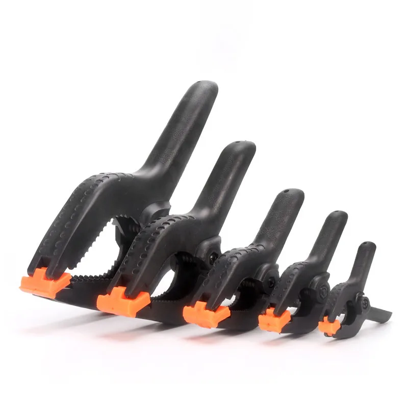 

Пластиковые зажимы для фотостудии