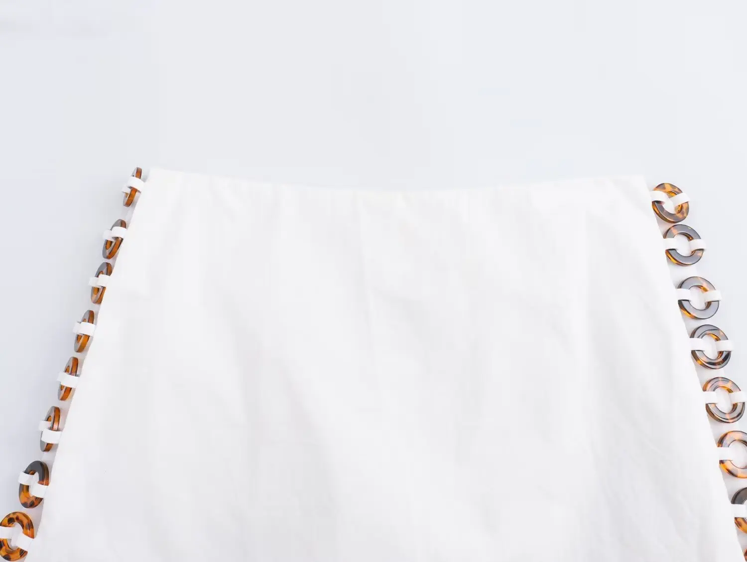 Женская мини-юбка с боковым кольцом и молнией однотонная