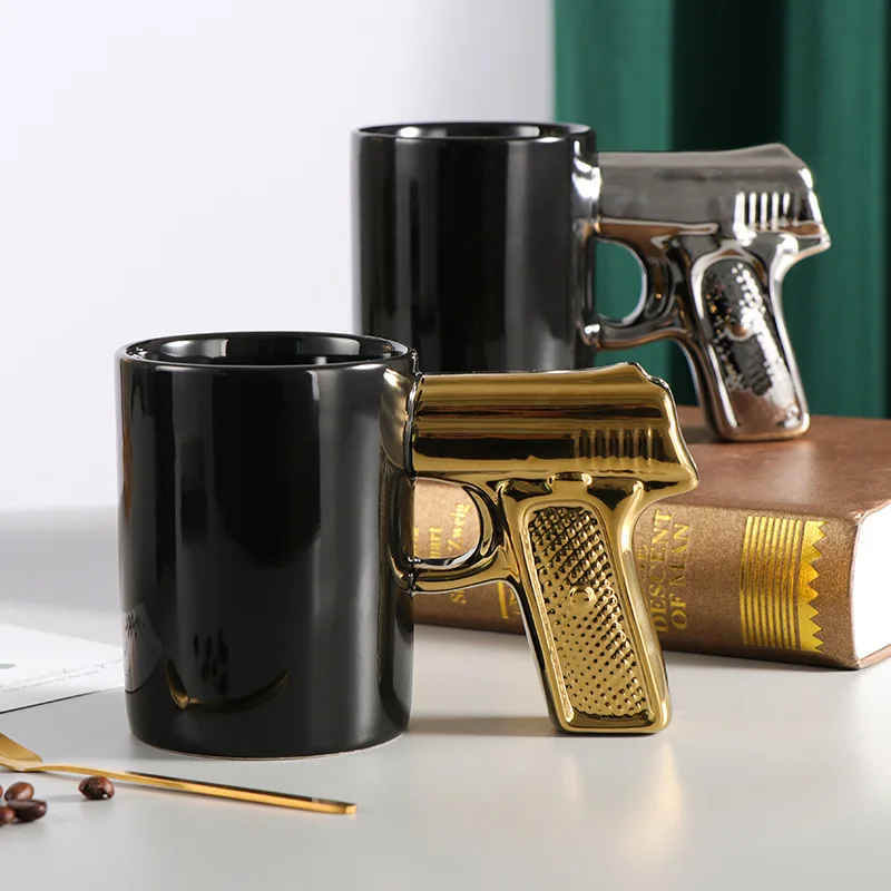 

Creative Ceramic Cup Gold Silver Pistol Modeling Mugs Novelty 3D Modeling Gun Handle Coffee Cup Milk Drinks Mug with Spoons Gift