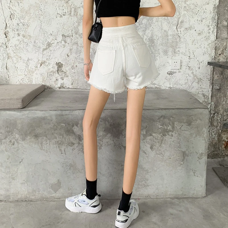 Женские рваные джинсы с высокой талией