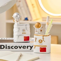 modern home decor cartoon astronaut pen holder figurines for interior decoration bookshelf office astronaut cosmonaut statues